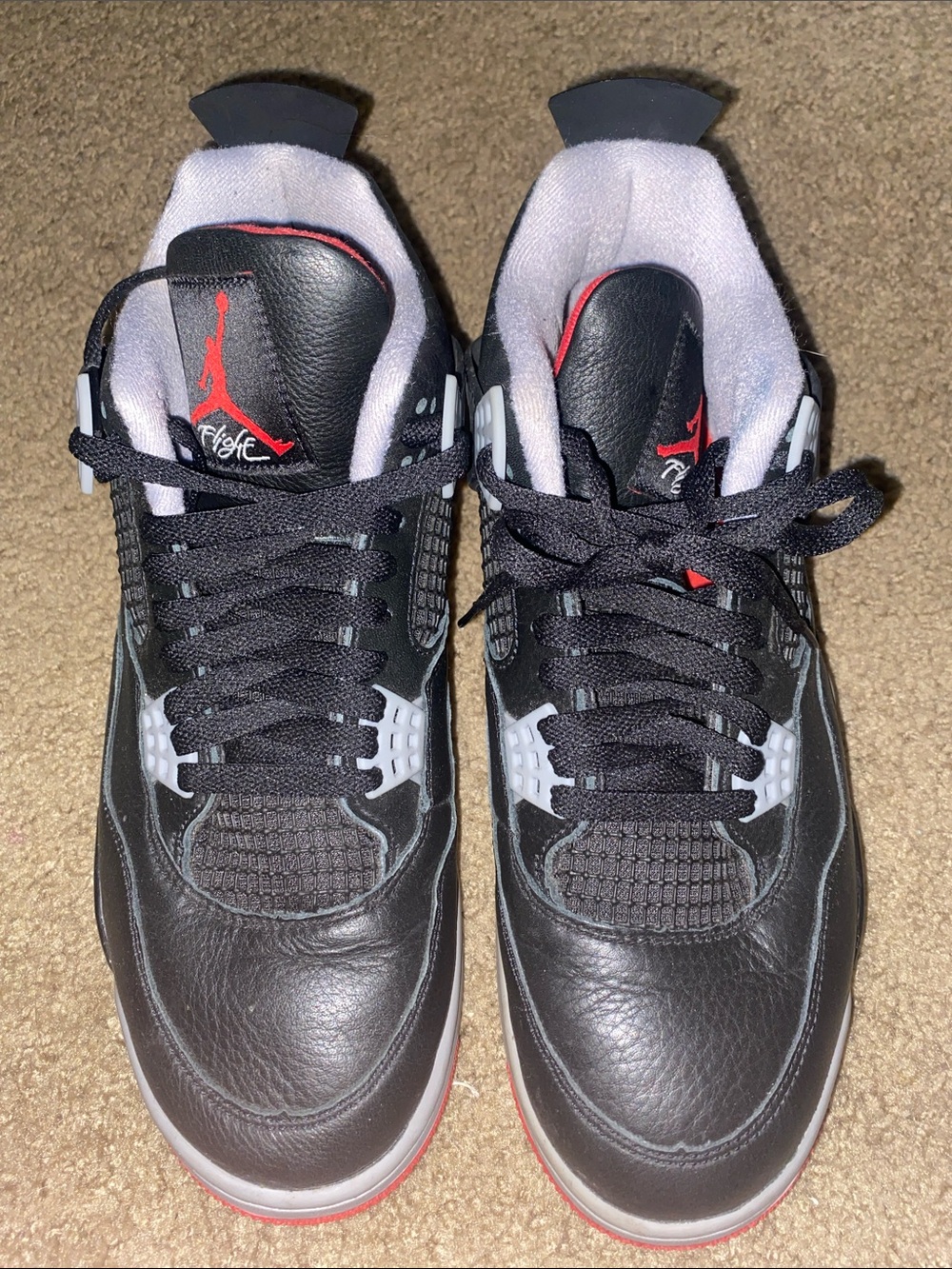 Jordan Men’s Black and Red Retro 4 Sneakers